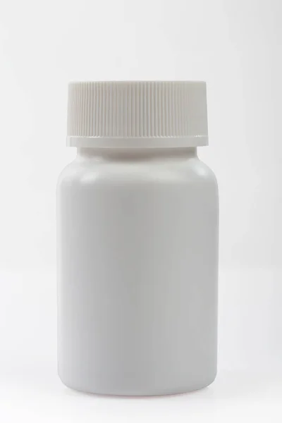 White pill plastic bottle isolated with clipping path. — Stock Photo, Image