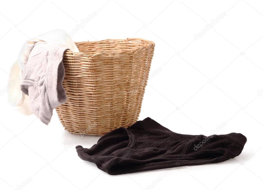 Close up of used male underwear in basket isolated on white clip