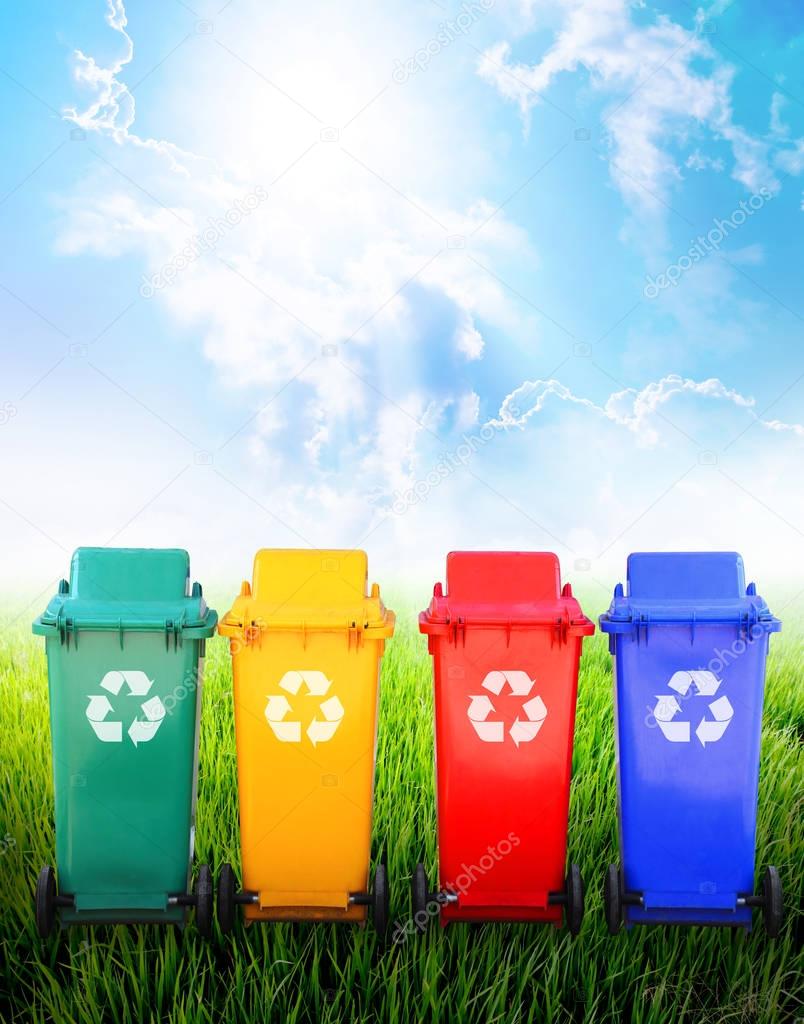 Colorful recycle bins in nature 