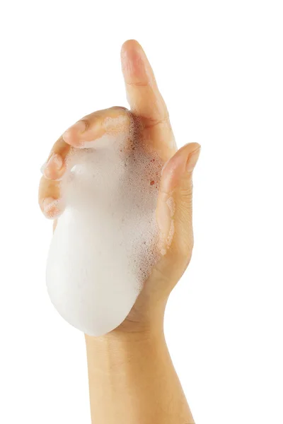 Frauenhand mit weißem Schaumstoff isoliert Clipping-Pfad. — Stockfoto