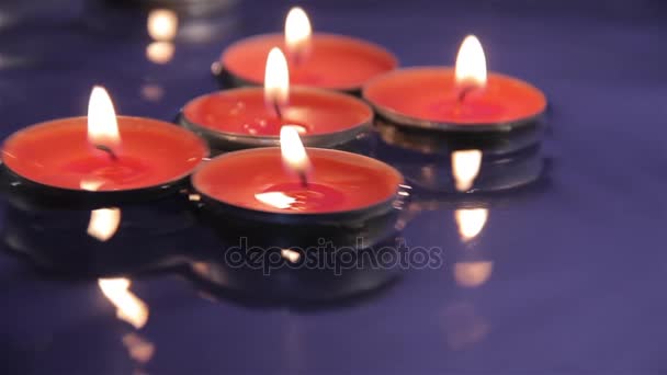 Candles on the water — Stock Video