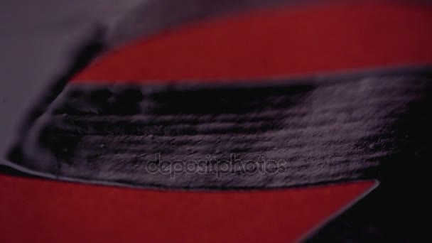 Caligrafia chinesa. Escrevendo em papel vermelho — Vídeo de Stock