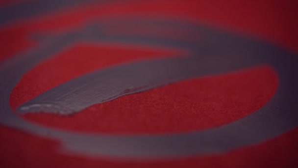 Chinese calligraphy. Writing on red paper — Stock Video