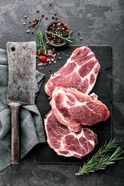 Fresh Steaks Raw Pork Meat Dark Stone Background Top View — Stock Photo, Image