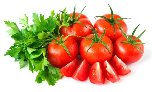 Delicious fresh red tomatoes with parsley leaves on a white isolated background — Stock Photo, Image