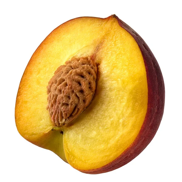 Pfirsich in einem Schnitt auf weißem Hintergrund isoliert — Stockfoto