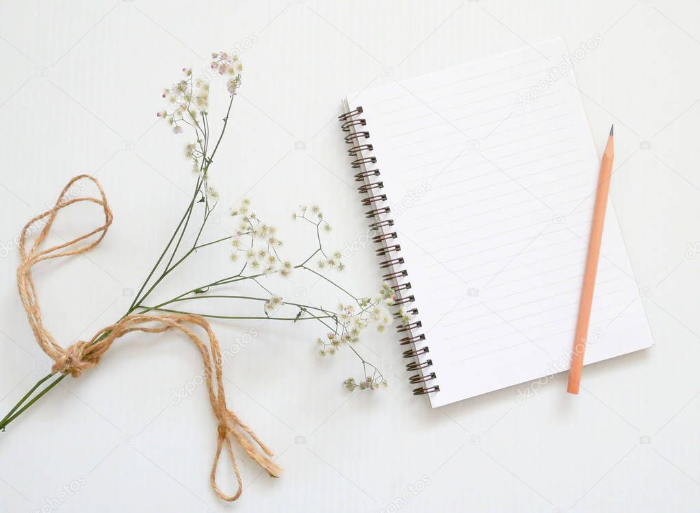 notebook and flower
