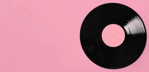 Vinyl LP record on pink background. — 스톡 사진