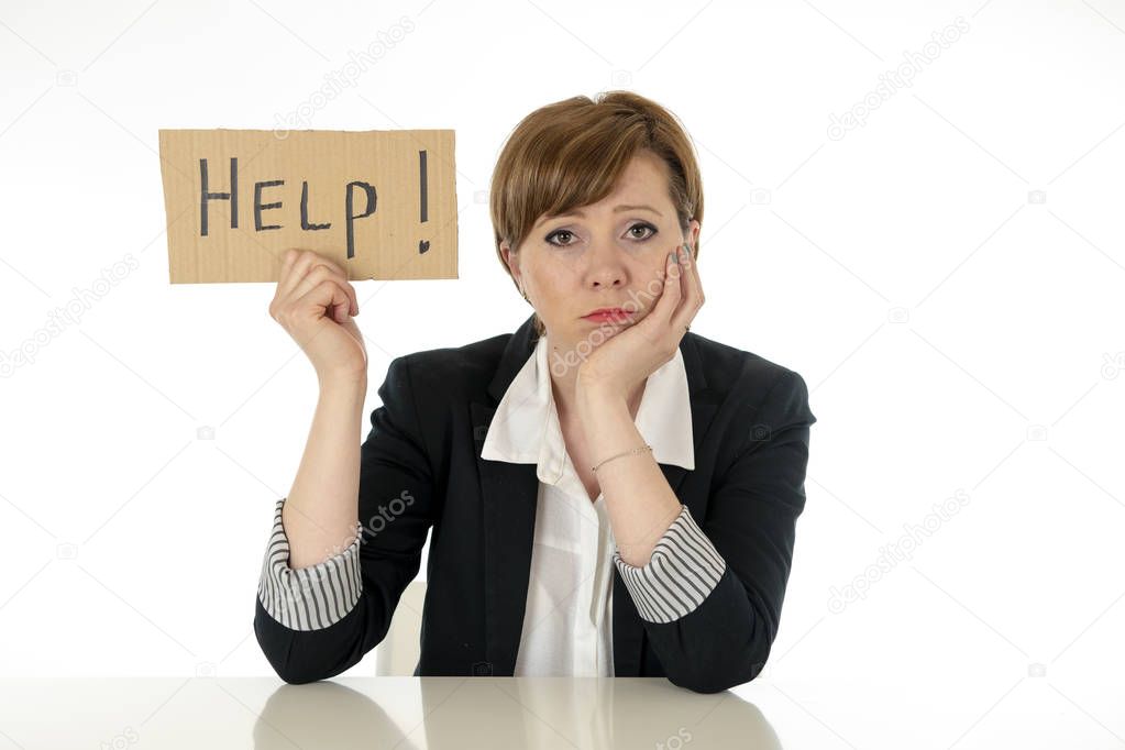 young beautiful red haired caucasian business woman overwhelmed and tired holding a help sign. looking Stressed, bored, frustrated, upset and unhappy at work. business frustration concept.