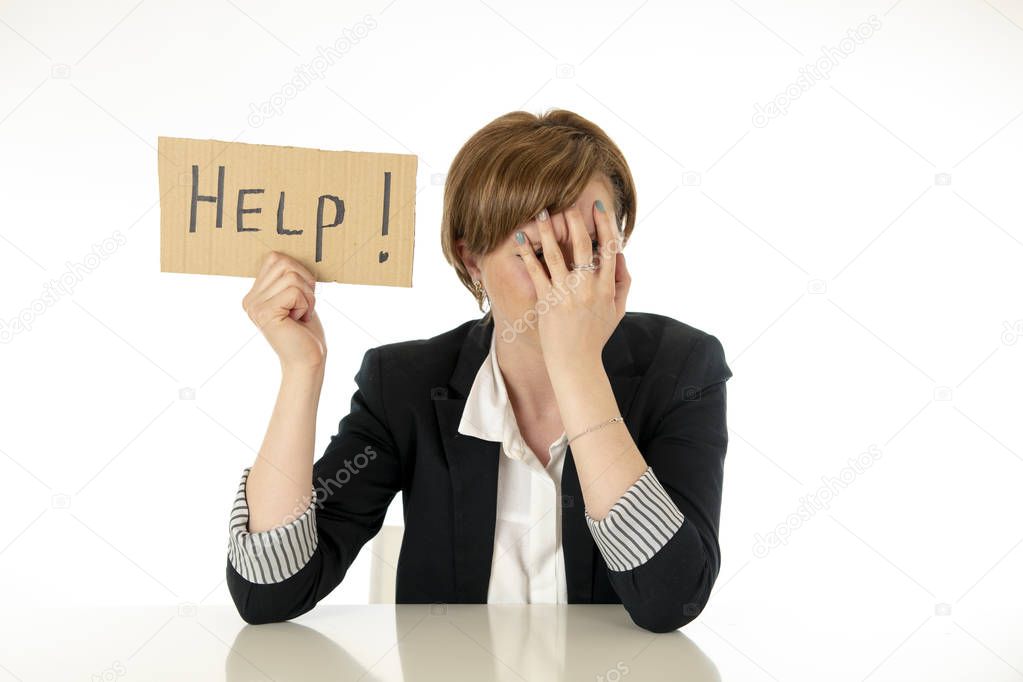 young beautiful red haired caucasian business woman overwhelmed and tired holding a help sign. looking Stressed, bored, frustrated, upset and unhappy at work. business frustration concept.