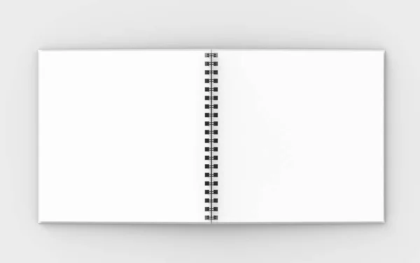 Квадратний спіральний записник сміється ізольовано на м'якому сірому спині — стокове фото