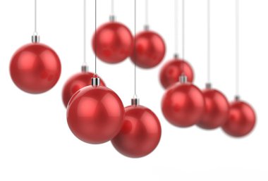 Seçici beyaz zemin üzerine izole kırmızı Noel topları 