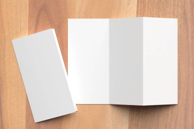Thrifold - üç broşür sahte ahşap arka plan üzerine katlayın. 3D 