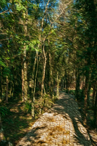 Paved pathway passing through wooded landscape