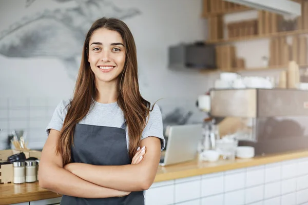 Pastry and coffee shop owner looking confident smiling at camera with arms crossed. Positive business concept. — Stock Photo, Image