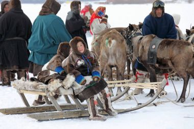 Indigenous people of Northern Siberia on a winter day in the Yam clipart