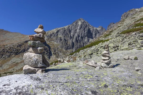 A pile of stones stacked in the mountains