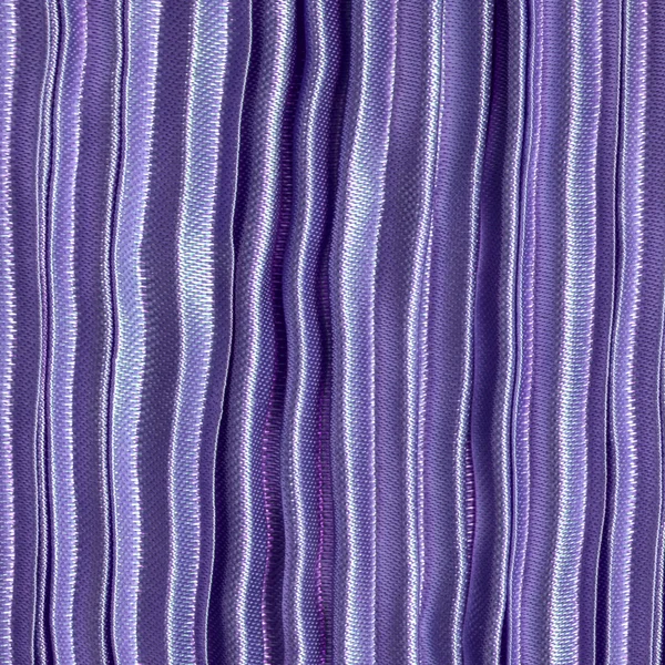 Textura de tela plisada violeta primer plano . — Foto de Stock