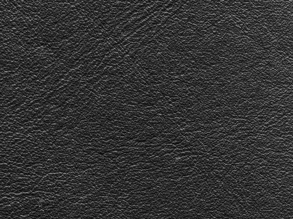Black leather texture closeup as background — Stock Photo, Image