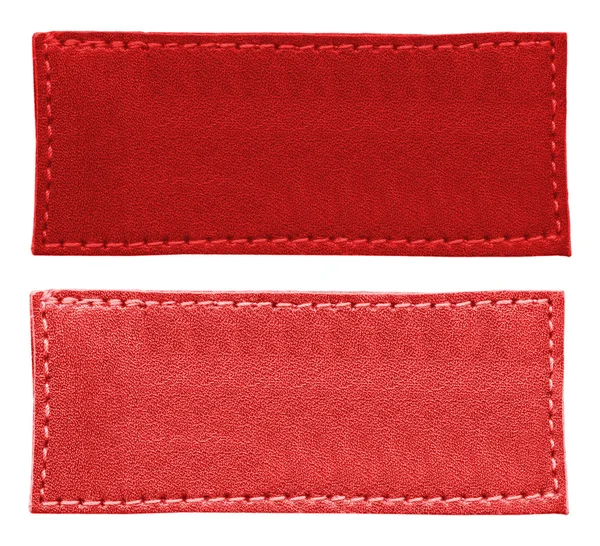 Two blank red  leather labels of different tint on white — Stock Photo, Image