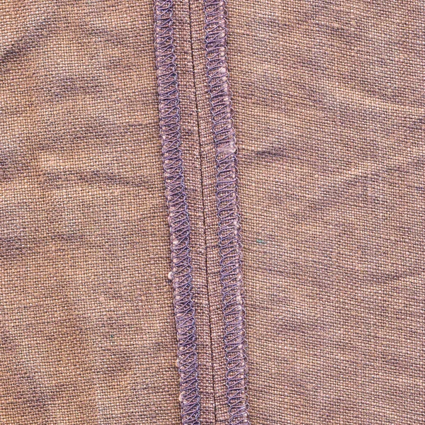 Brown denim texture,wrong side, back seam — Stock Photo, Image