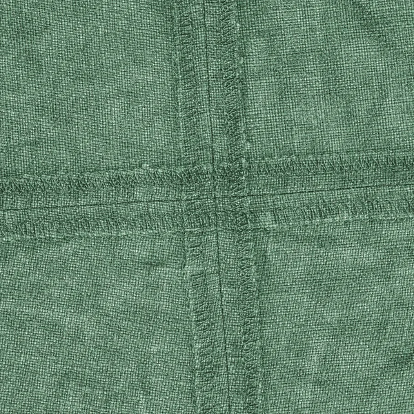 Green denim texture,wrong side, back seams — Stock Photo, Image