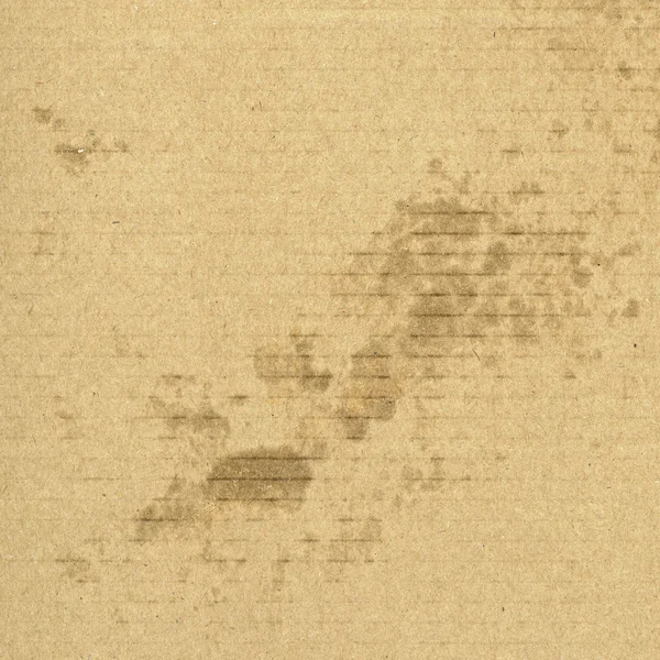 Old dirty beige cardboard texture. Useful for background — Stockfoto