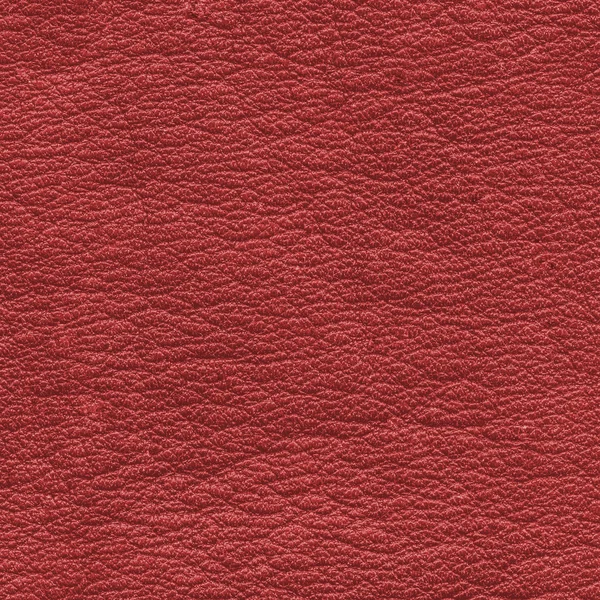 Old red leather surface closeup as background — Stockfoto