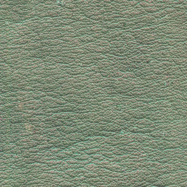 Old green leather texture closeup as background — Stockfoto