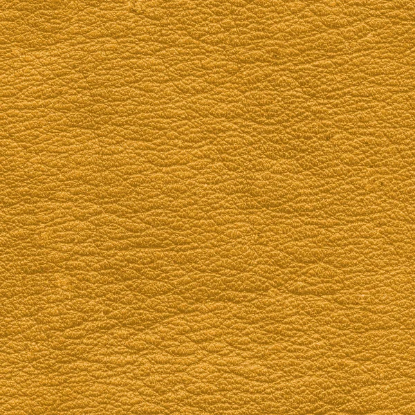 Superficie de cuero amarillo primer plano como fondo —  Fotos de Stock