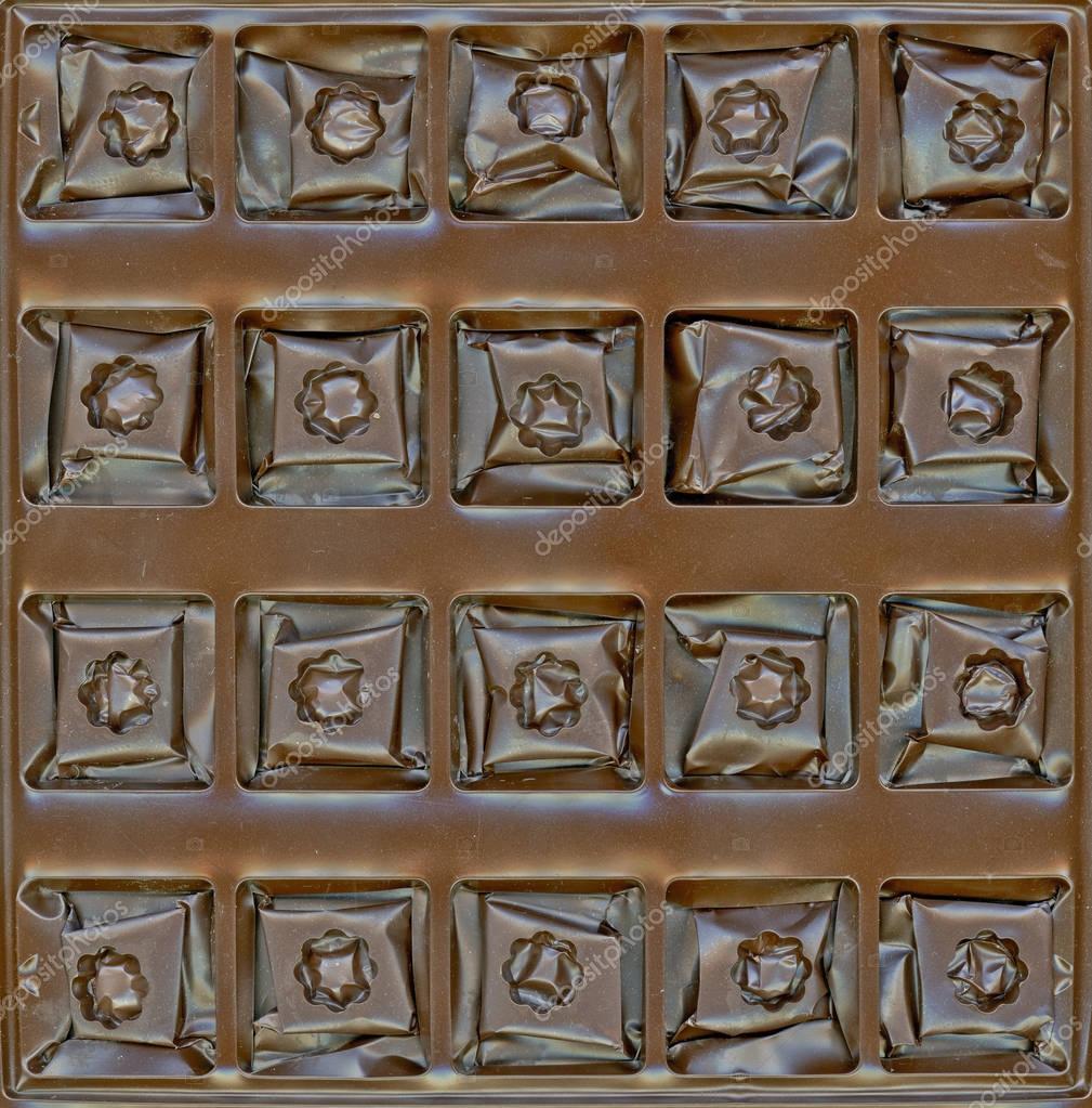 Chocolate candy in a box Stock Photo by ©natalt 129555856