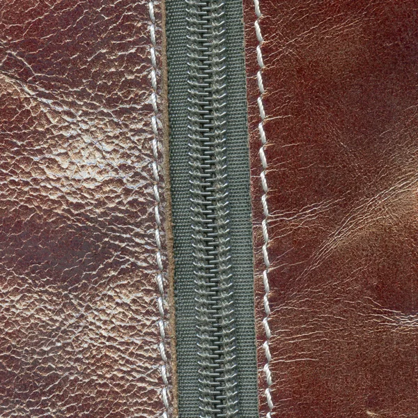 Textura de cuero rojo-marrón, cremallera — Foto de Stock
