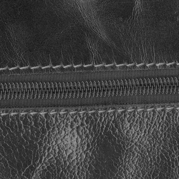 Textur aus schwarzem Leder, Reißverschluss — Stockfoto