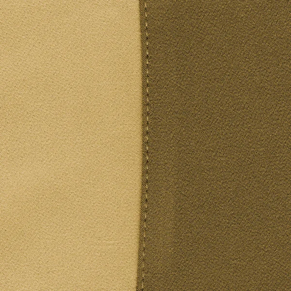 arka plan olarak sarı-kahverengi kumaş dokular 