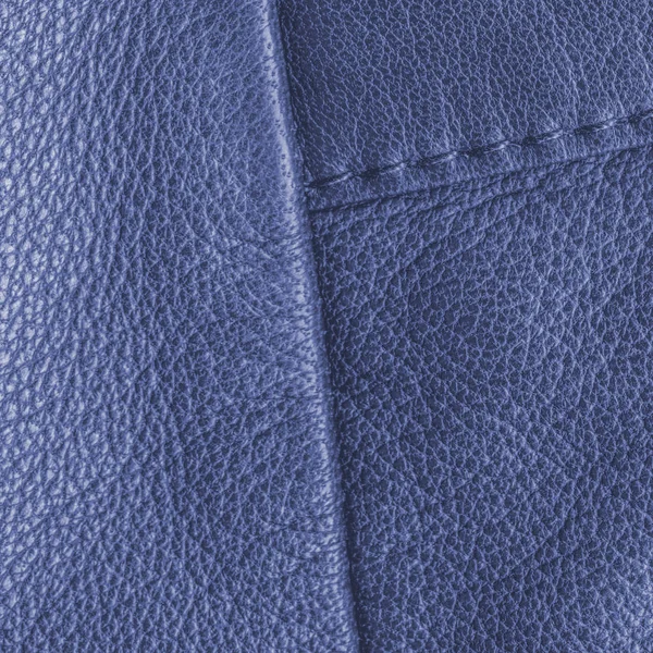 Fond bleu cuir, couture, points de suture — Photo