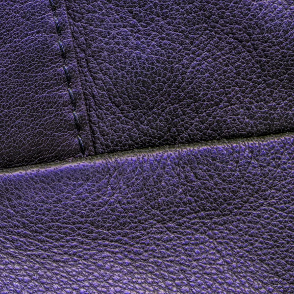 Mörk violett läder bakgrund, söm, stygn — Stockfoto