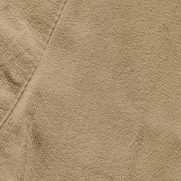 Fondo de cuero marrón claro decorado con una costura — Foto de Stock