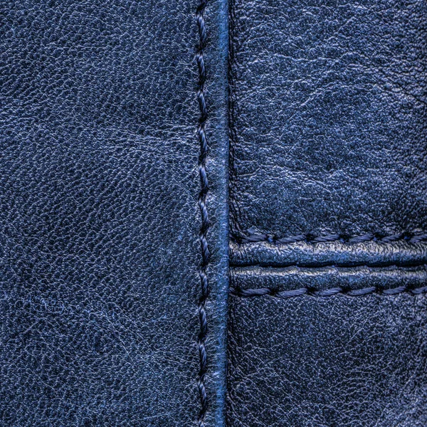 Texture cuir bleu ornée de coutures — Photo