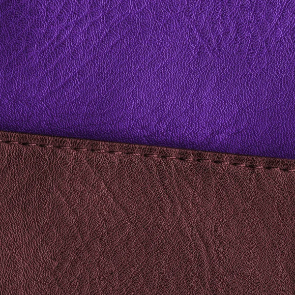 棕色紫色皮革背景装饰着一条缝 — 图库照片