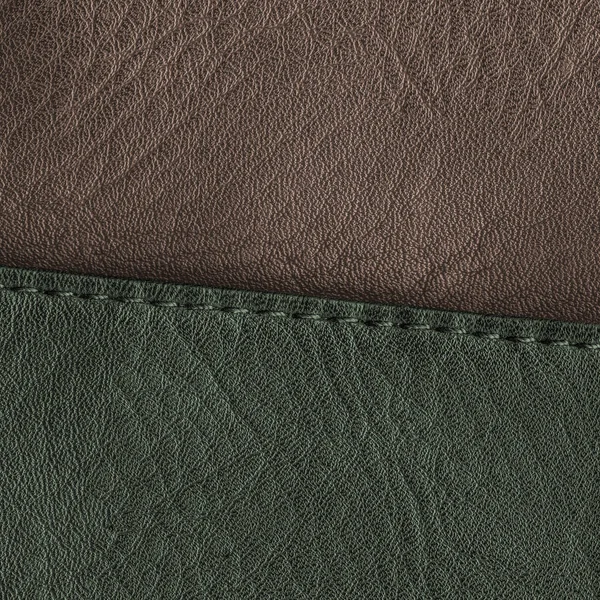 Green-brown leather background,seam — Stock Photo, Image