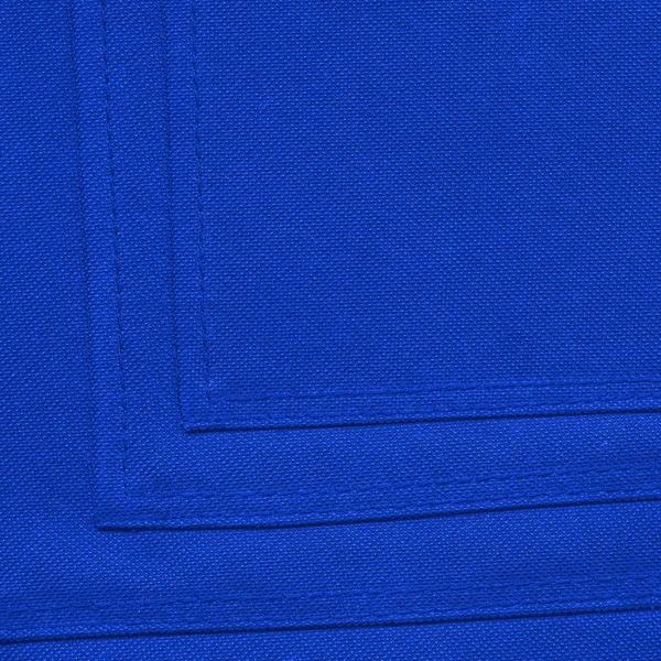 Modrý textilní textury jako pozadí — Stock fotografie