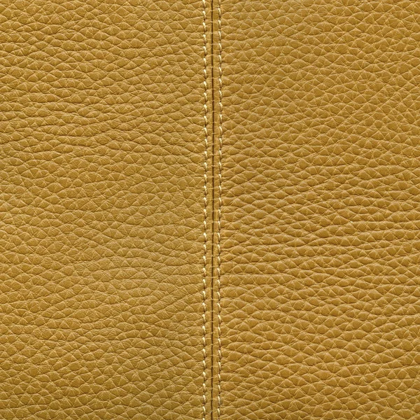 Textura de couro amarelo, costura — Fotografia de Stock
