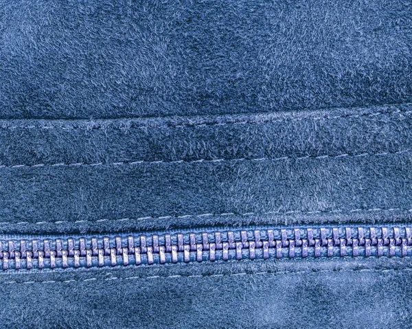 Blue roughly dressed leather texture, zipper — Stock Photo, Image