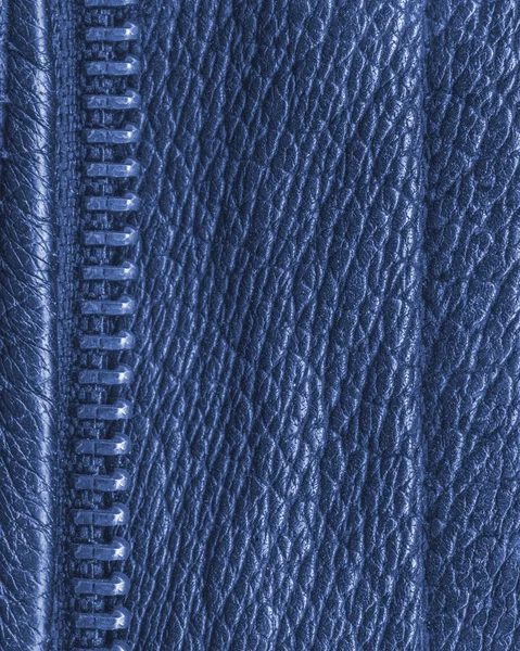 Blue leather texture decorated with a zipper closeup — Stock Photo, Image