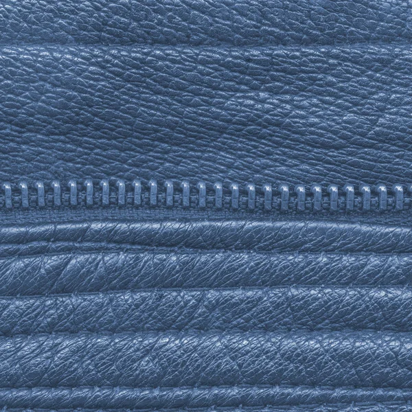 Blue leather background decorated with seams and zipper — Stock Photo, Image