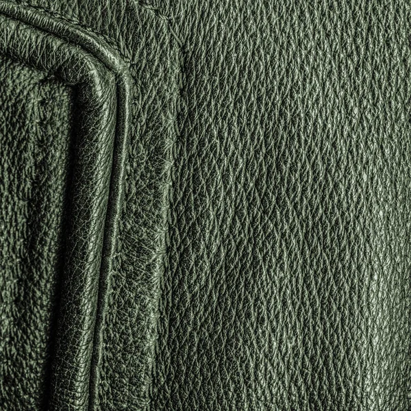 Fragment of leather jacket as green leather background — Stock Photo, Image