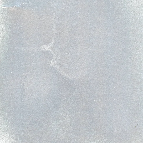 A sheet of paper painted in silver gray color — Stock Photo, Image