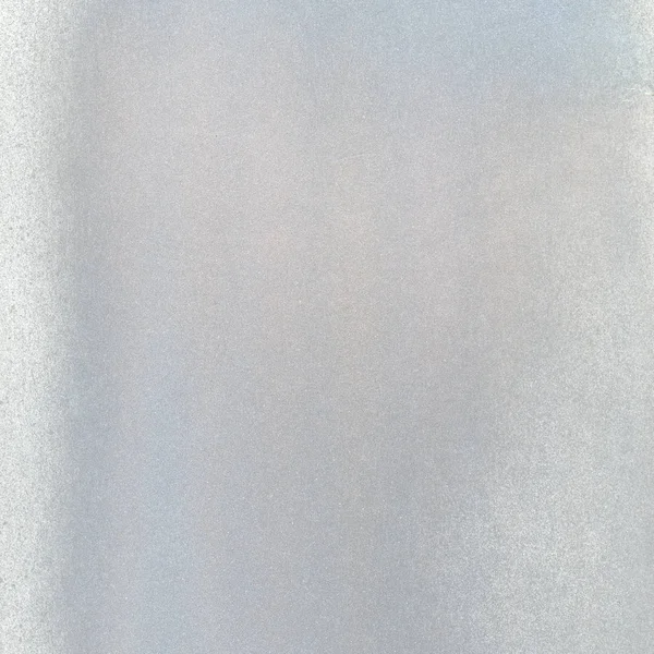 Uma folha de papel pintado na cor cinza prata — Fotografia de Stock