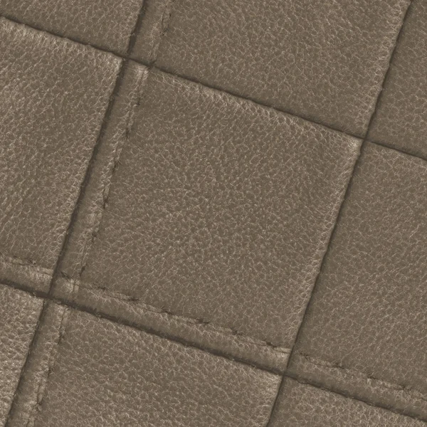Ljusbrunt läder textur med sömmar närbild. — Stockfoto