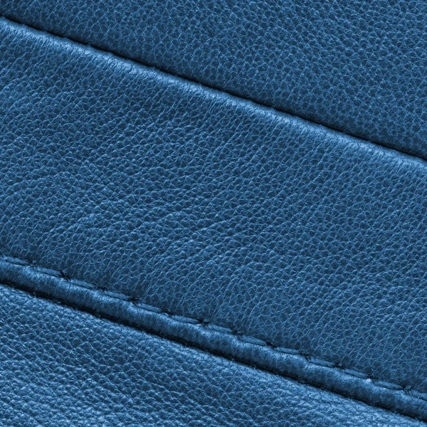 Blue leather background with seams closeup — Stock Photo, Image